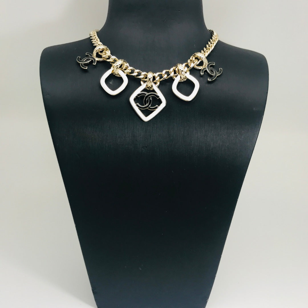 MULTI CHARM PINK GOLD BLACK ENAMEL NECKLACE