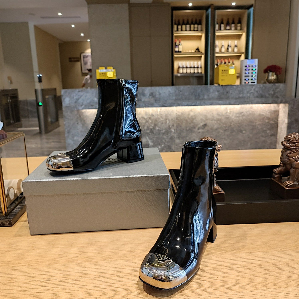 Prada 26s Metallic-Toe Triangle Logo Ankle Boots 5cm Black Patent Leather 109446