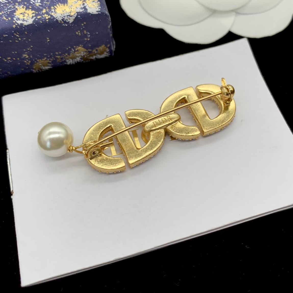 CD Brooch 178847