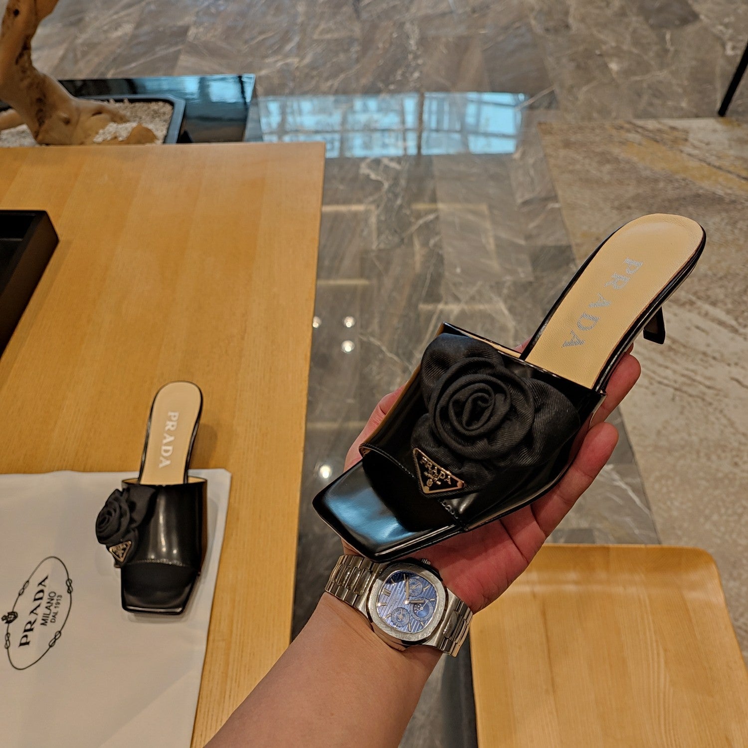 Prada 26s Open Toe Mules 45mm In Black Patent Calfskin With Rosette