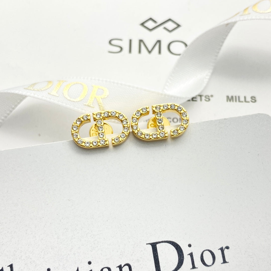 CD 26S Crystal Logo Stud Earrings In Gold Metal 633106