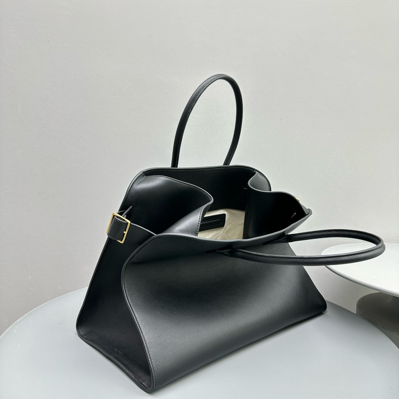 The Row Margaux 17 Black Cowhide