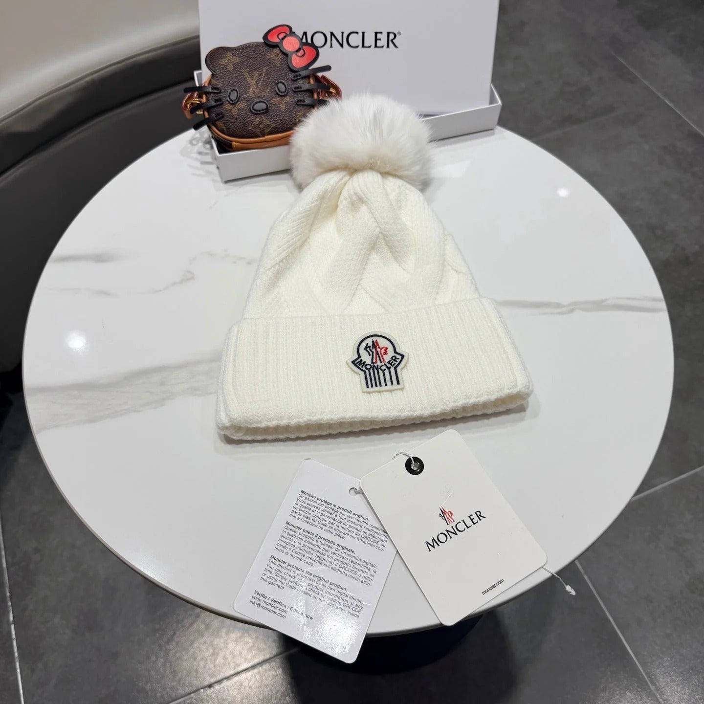 Moncler Wool Hat With Pom-pom 435188