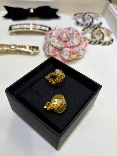 Chanel Gripoix Earrings With Gold CC Logo And Red Glass Stones