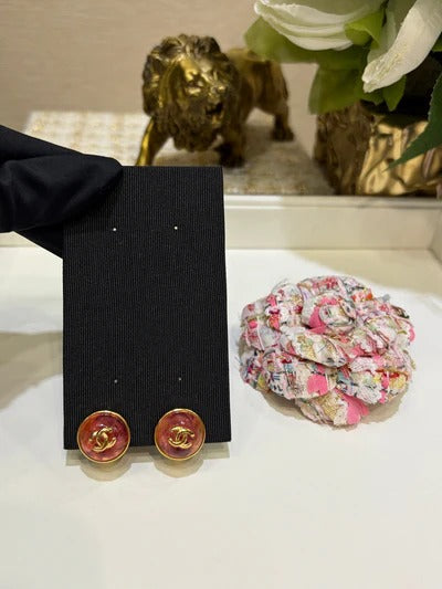 Chanel Gripoix Earrings With Gold CC Logo And Red Glass Stones