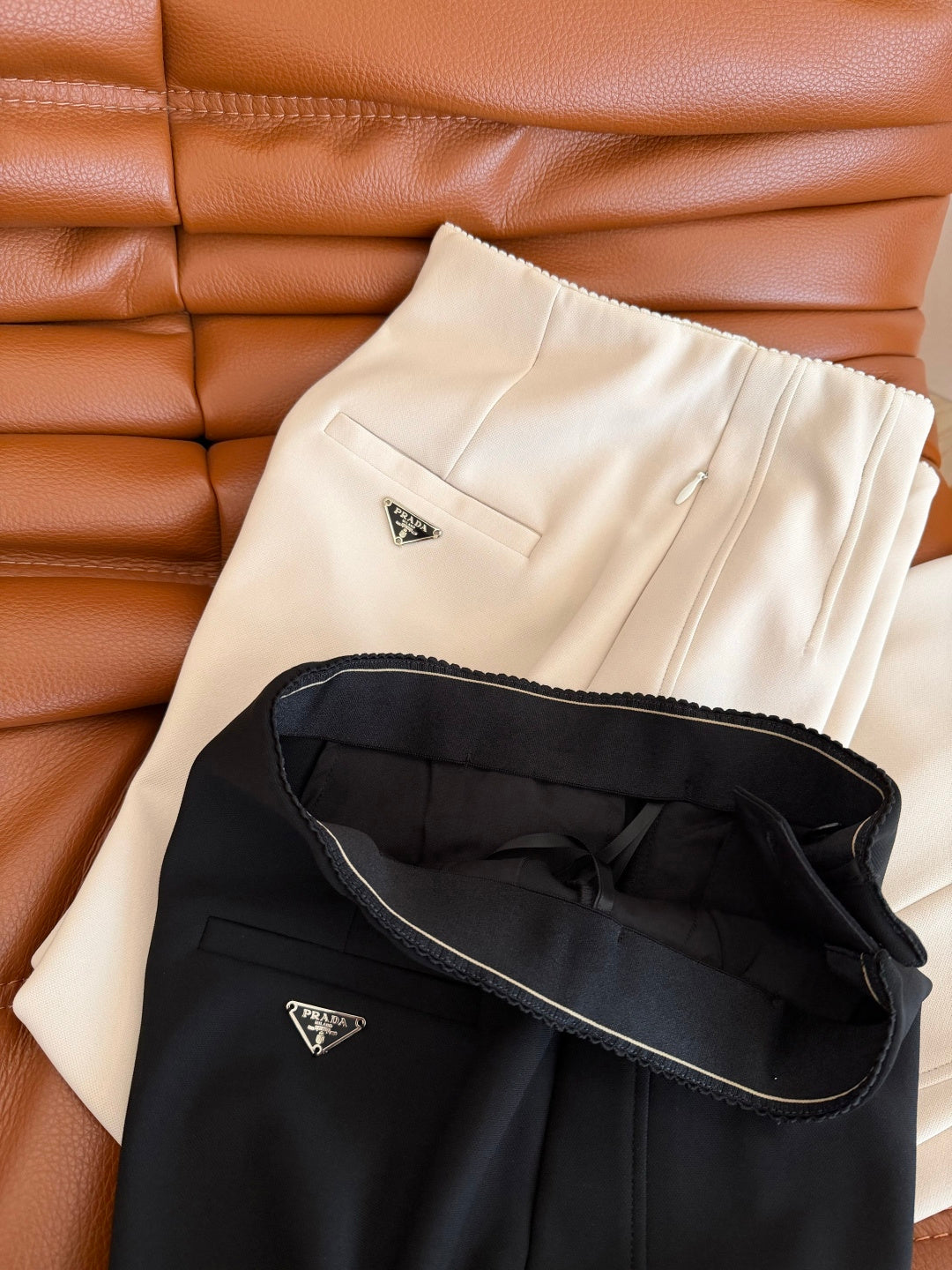 Prada 26s Flared Pants With A Triangular Logo 420883