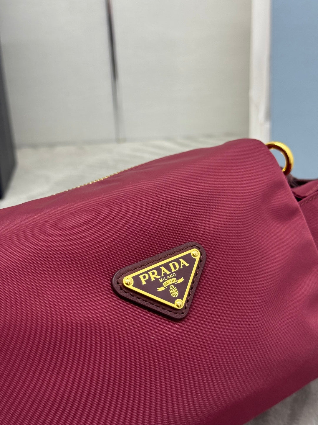 Prada 26s Small Explore Burgundy Re-Nylon 144444