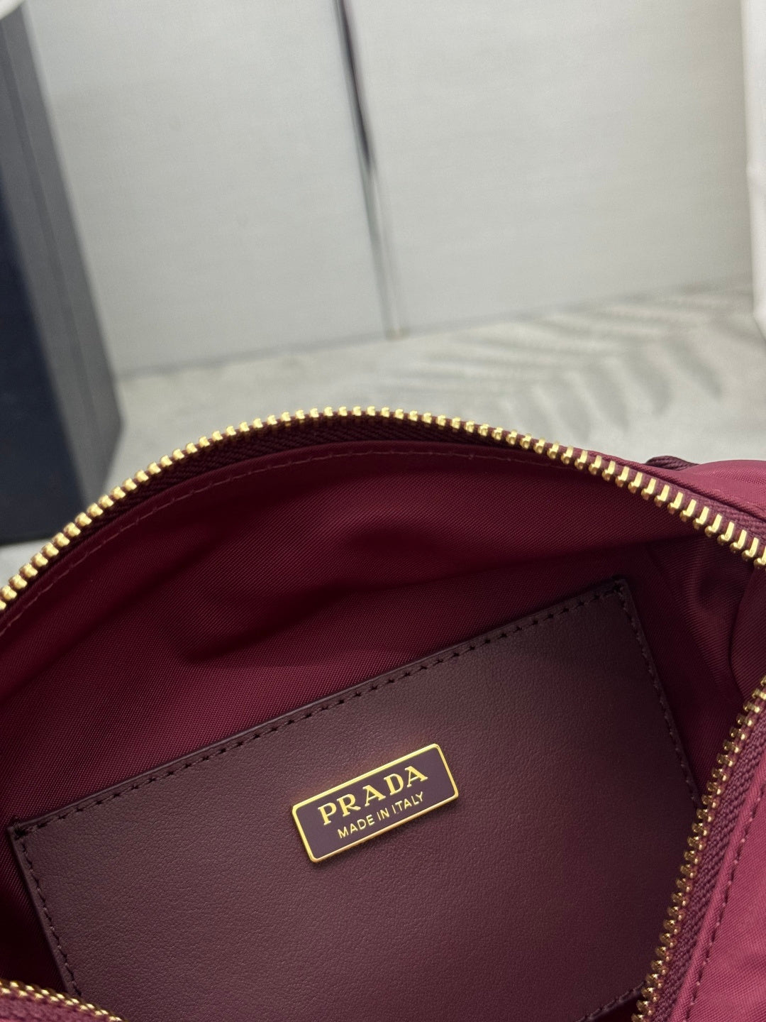 Prada 26s Small Explore Burgundy Re-Nylon 144444