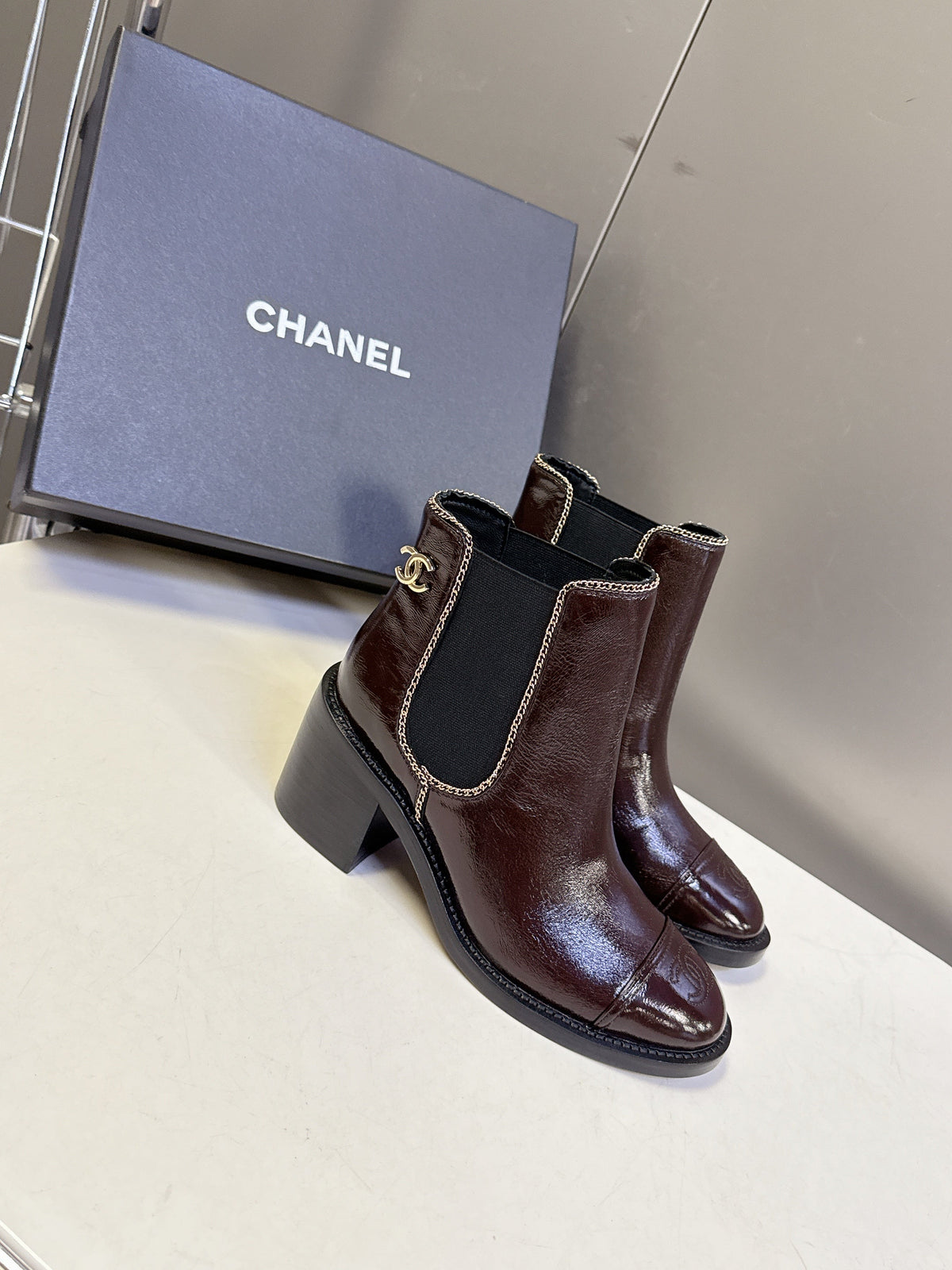CC 26s Chain-Embellished Ankle Boots Brown Glossy Lambskin 948055