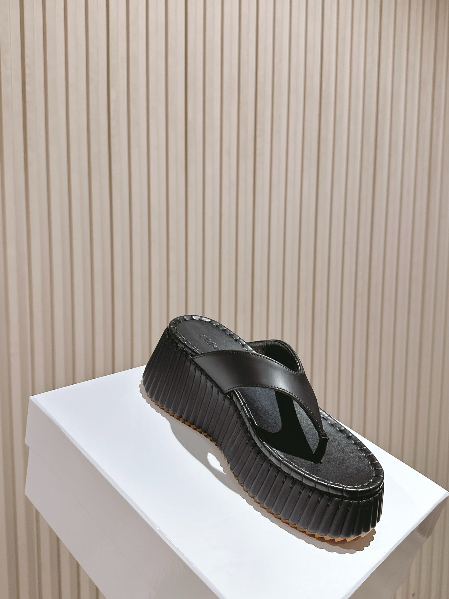 Chloé 26S Platform Flip-Flops in Black Lambskin.