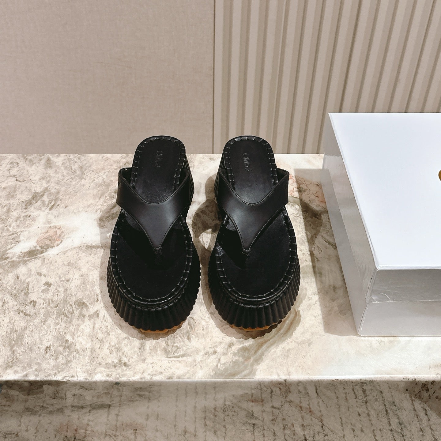 Chloé 26S Platform Flip-Flops in Black Lambskin.