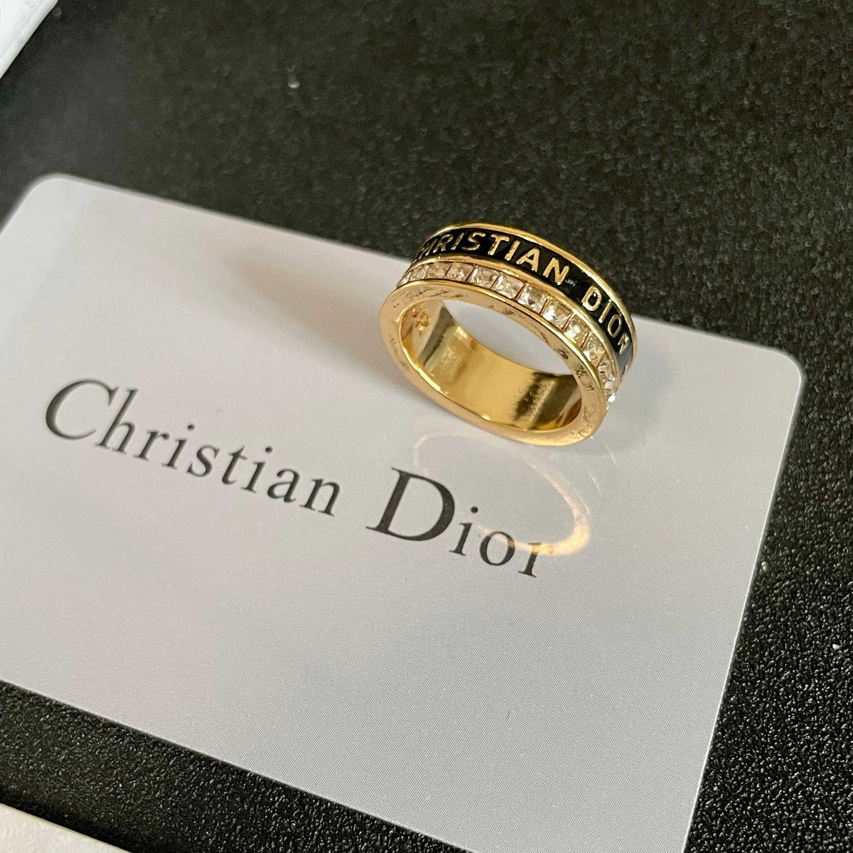 CD 26S Crystal Band Logo Ring In Gold Tone Metal 630811