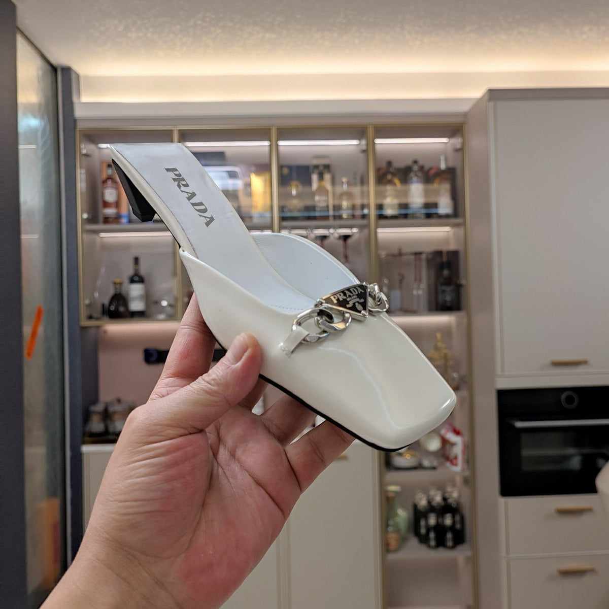 Prada 26s Chain Logo Mules 4.5cm Cream Patent Leather 109410