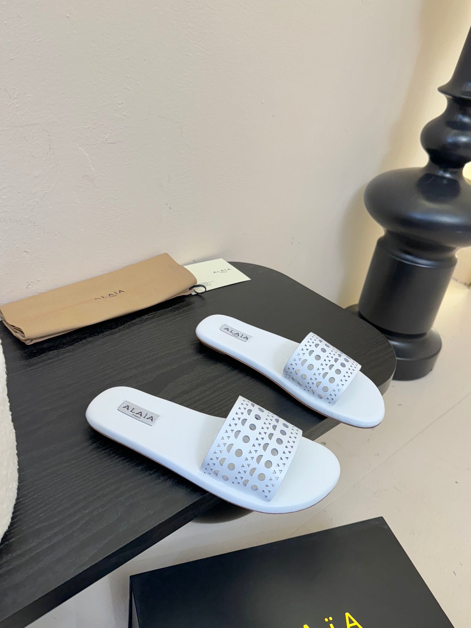 Alaia women laser-cut white leather slide 235540