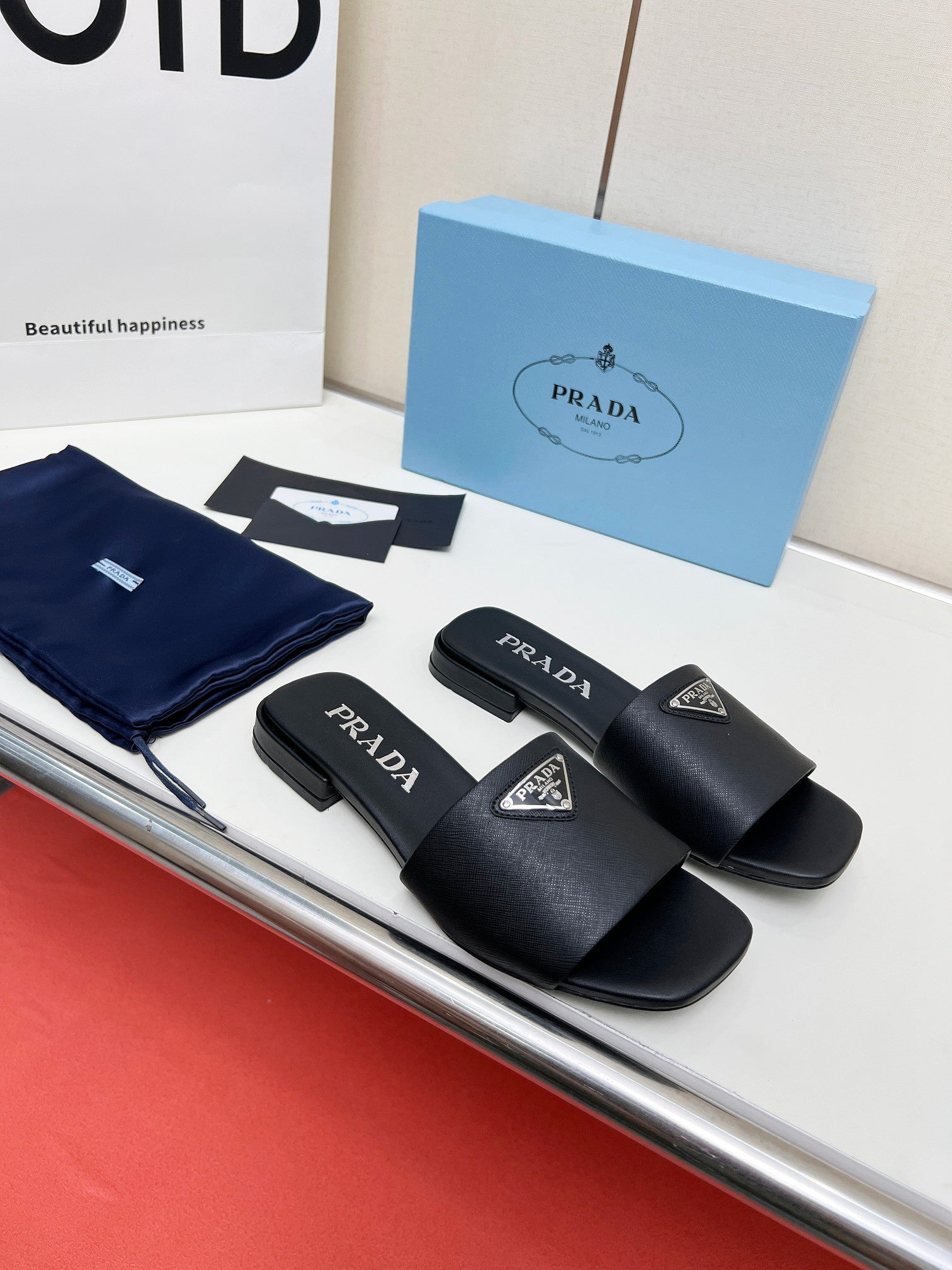 Prada 26s Saffiano Slides Black Leather 986630