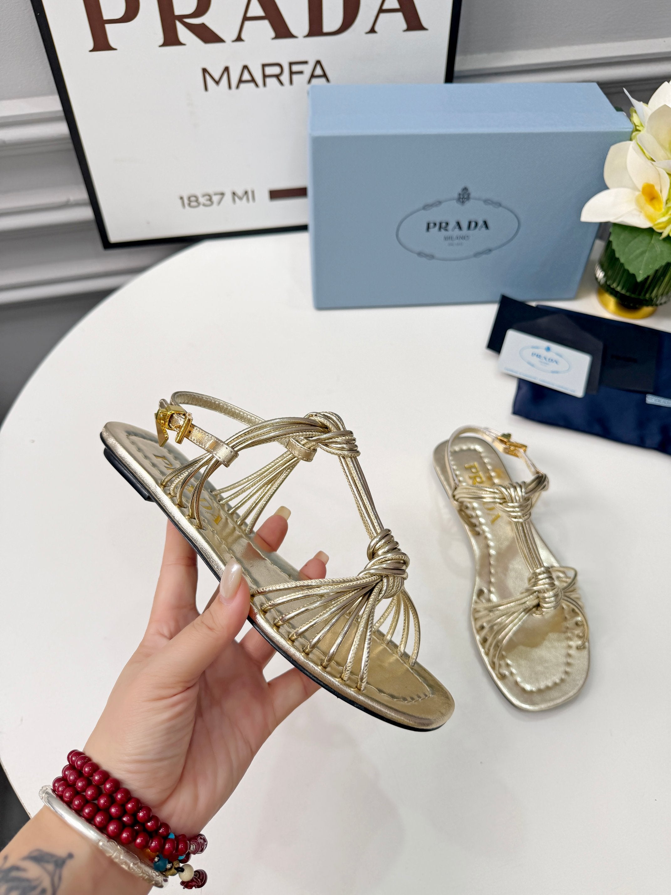 Prada 26s Knotted Metallic Leather Flat Sandals Gold Metalic Leather 986578