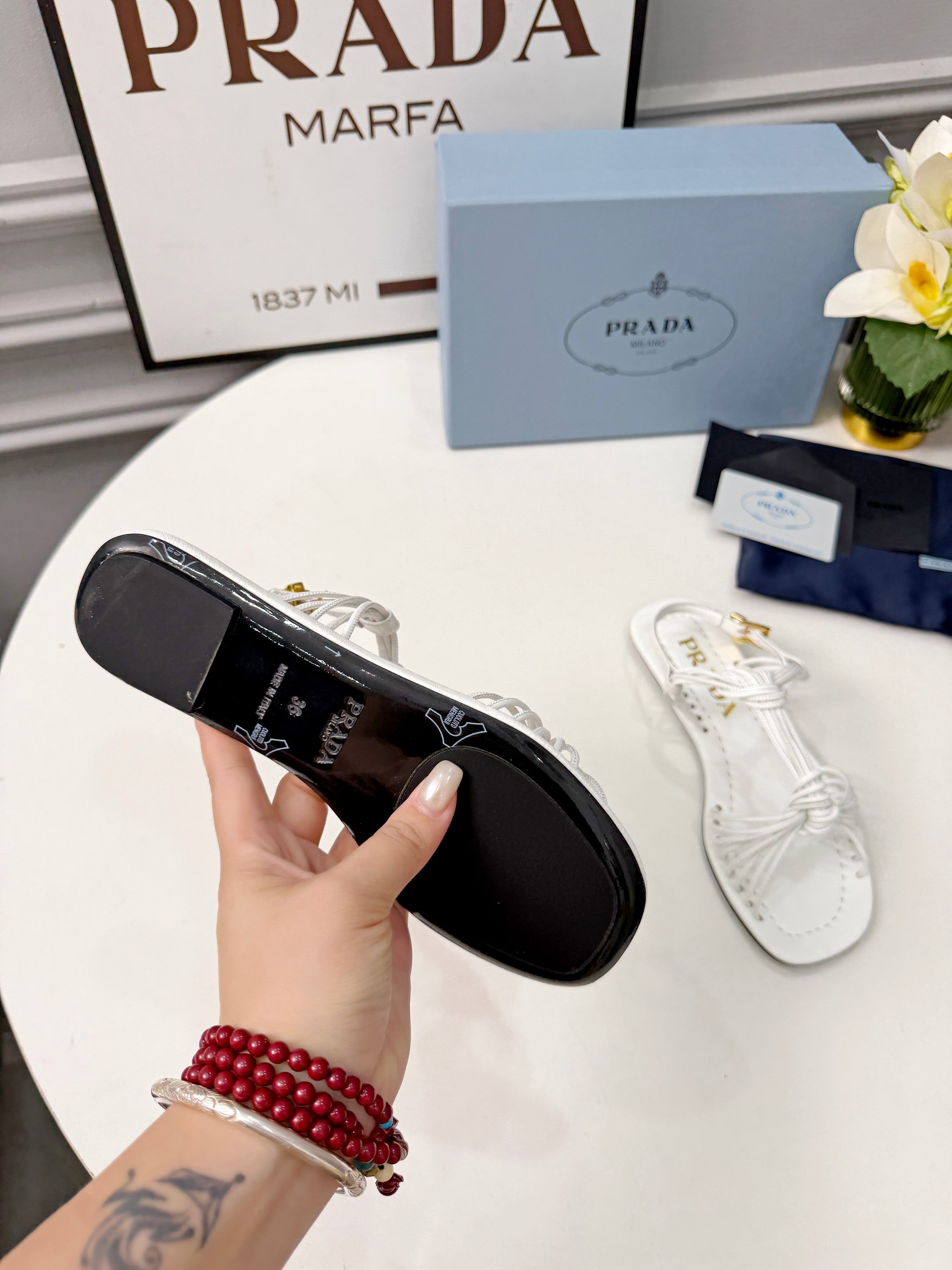 Prada 26s Knotted Metallic Leather Flat Sandals White Leather 986576