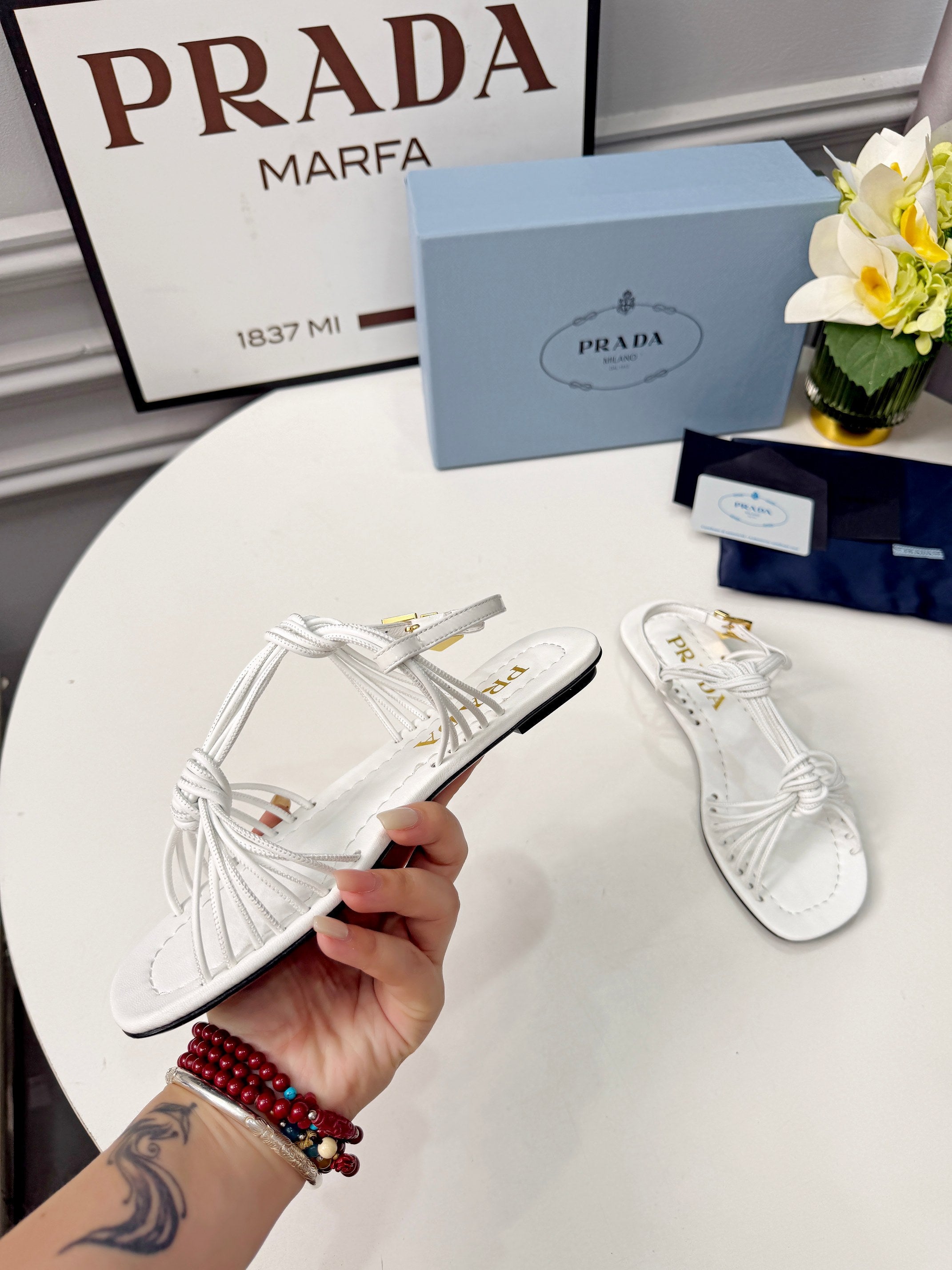 Prada 26s Knotted Metallic Leather Flat Sandals White Leather 986576