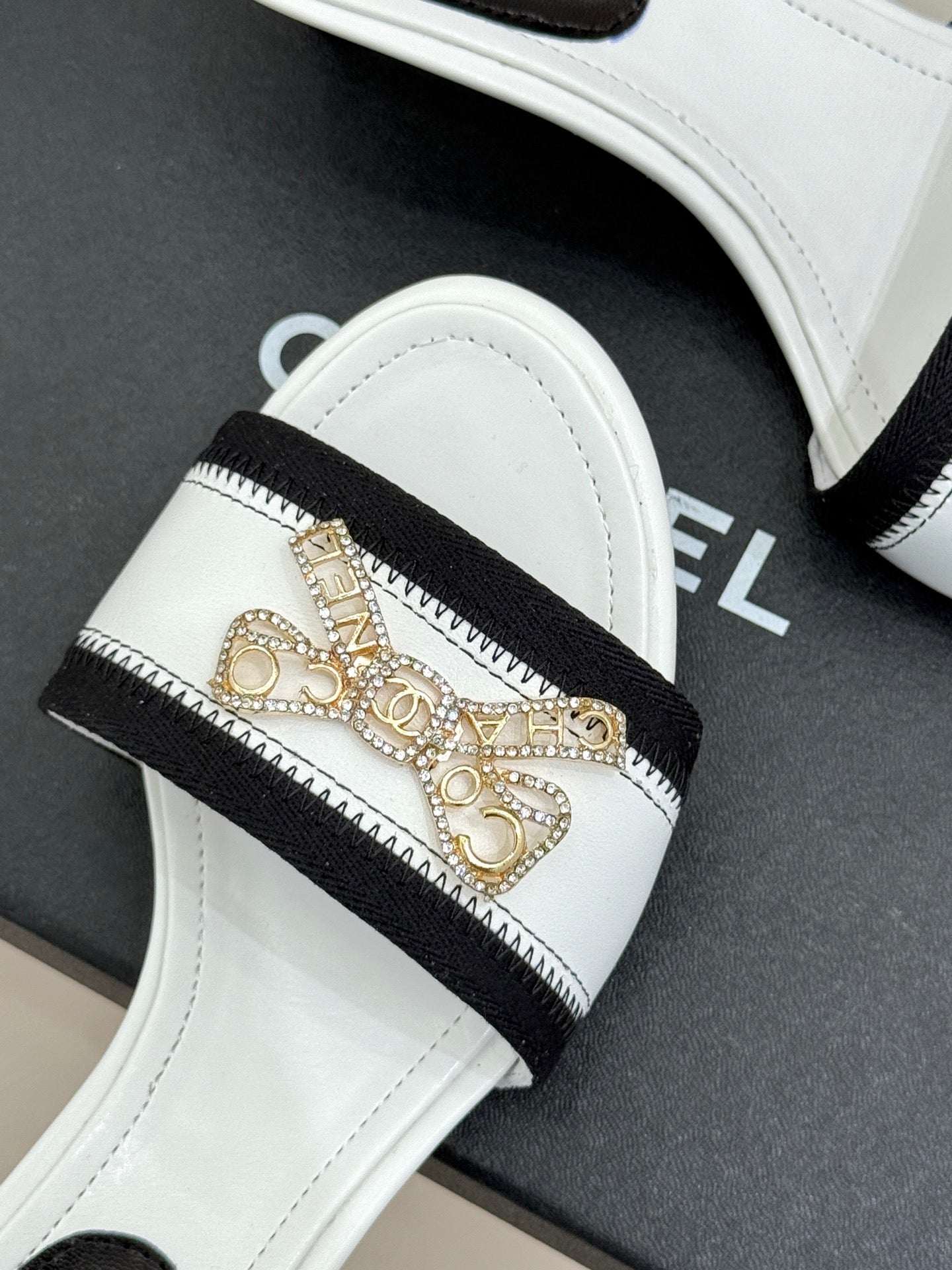 CC Classic Rhinestone Bow Kitty Slippers Black White Sheepskin 643092