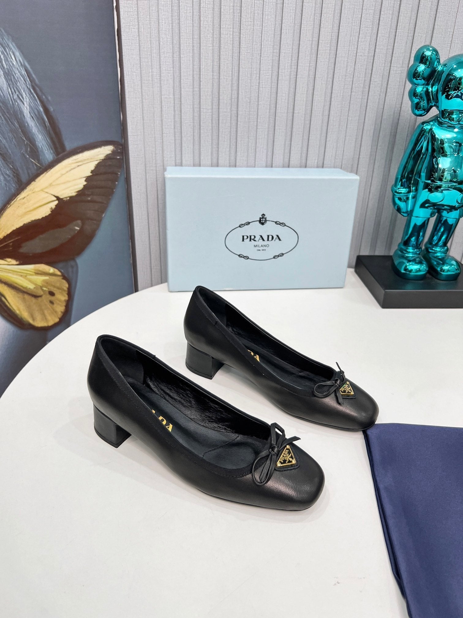 Prada 26s Round Toe Pumps Block Heel 40mm In Black Calfskin With Bow