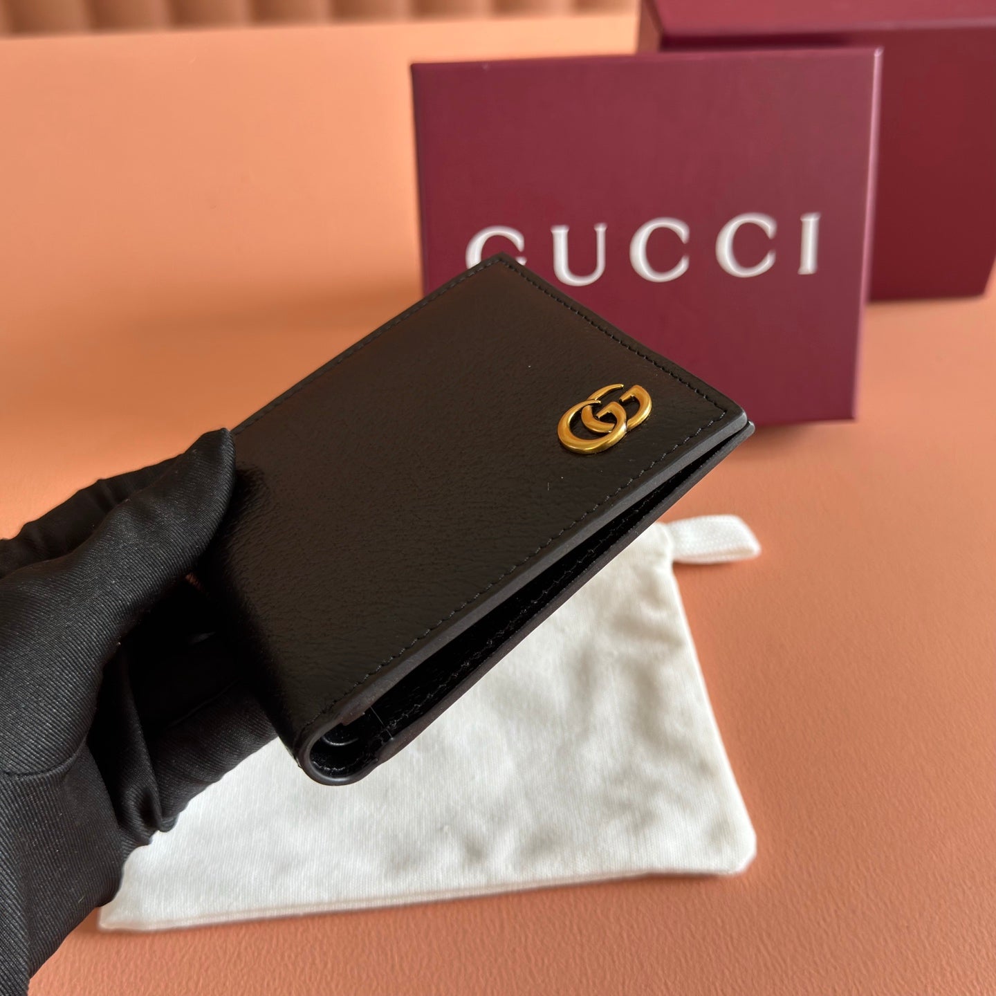 GG Marmont Bi-Fold Wallet Black Pebbled Leather GHW