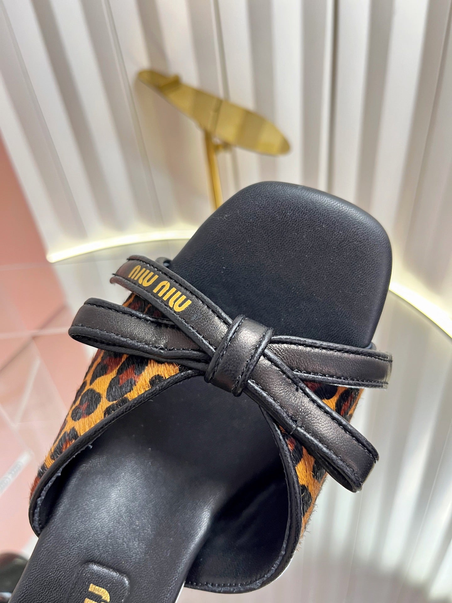 Miumiu 26s Mule Sandals 55mm In Leopard Print Calf Hair With Bow
