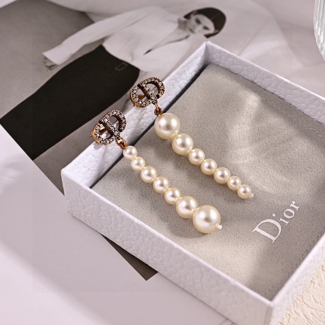 CD 26S Pave Logo Pearl Drop Earrings In Gold Tone Metal 631791