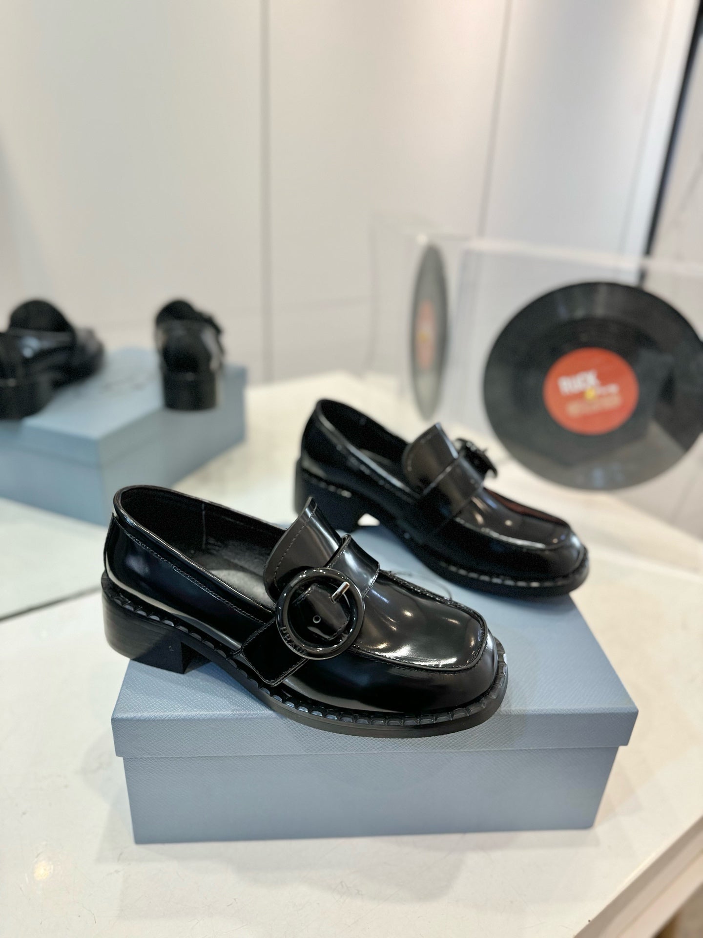 Prada 26s Heeled Loafers Black Brushed Leather 941519