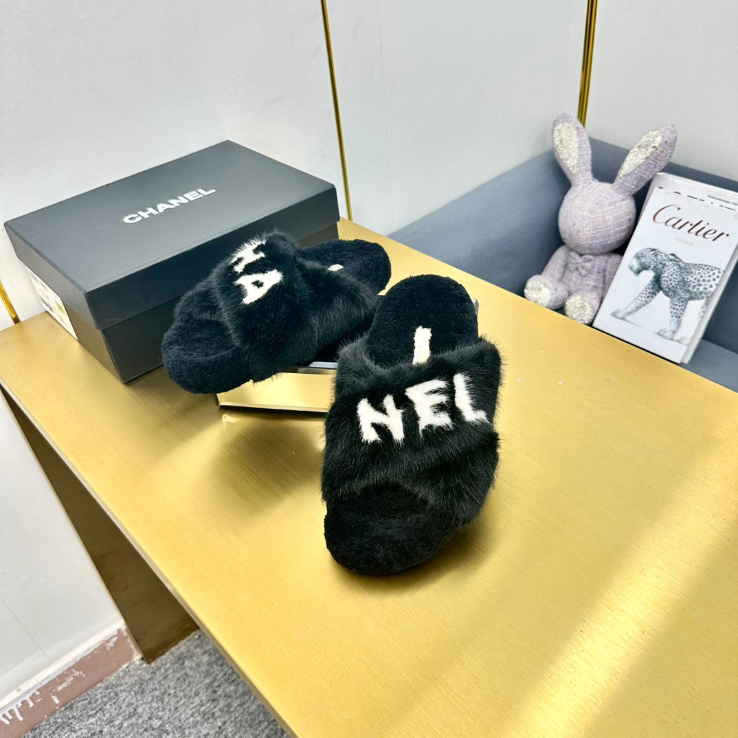 CC 26s Crisscross Sandals Black White Shearling 139990