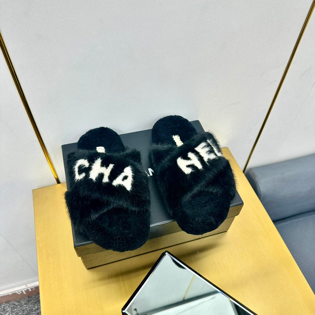 CC 26s Crisscross Sandals Black White Shearling 139990