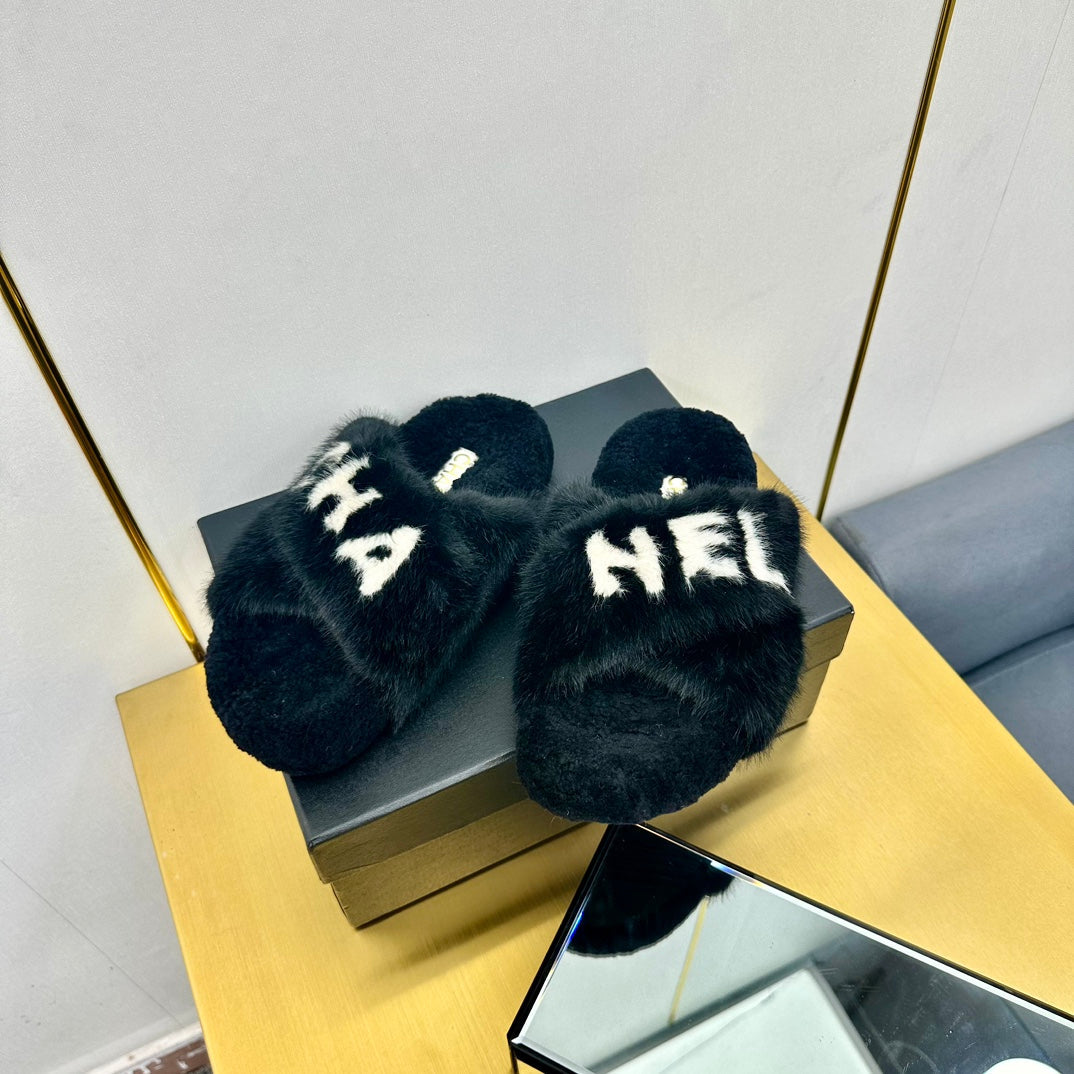 CC 26s Crisscross Sandals Black White Shearling 139990