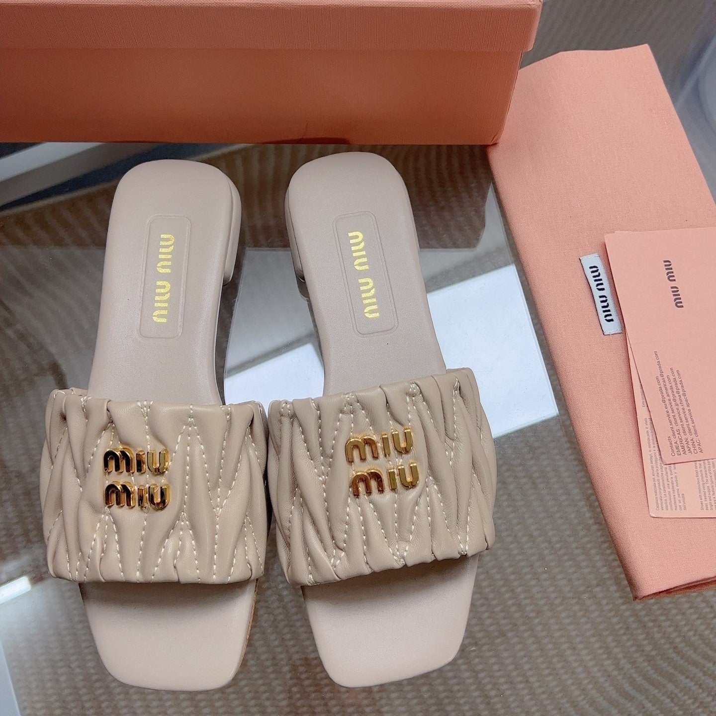 Miu Matelassé Slides Taupe Leather 739551