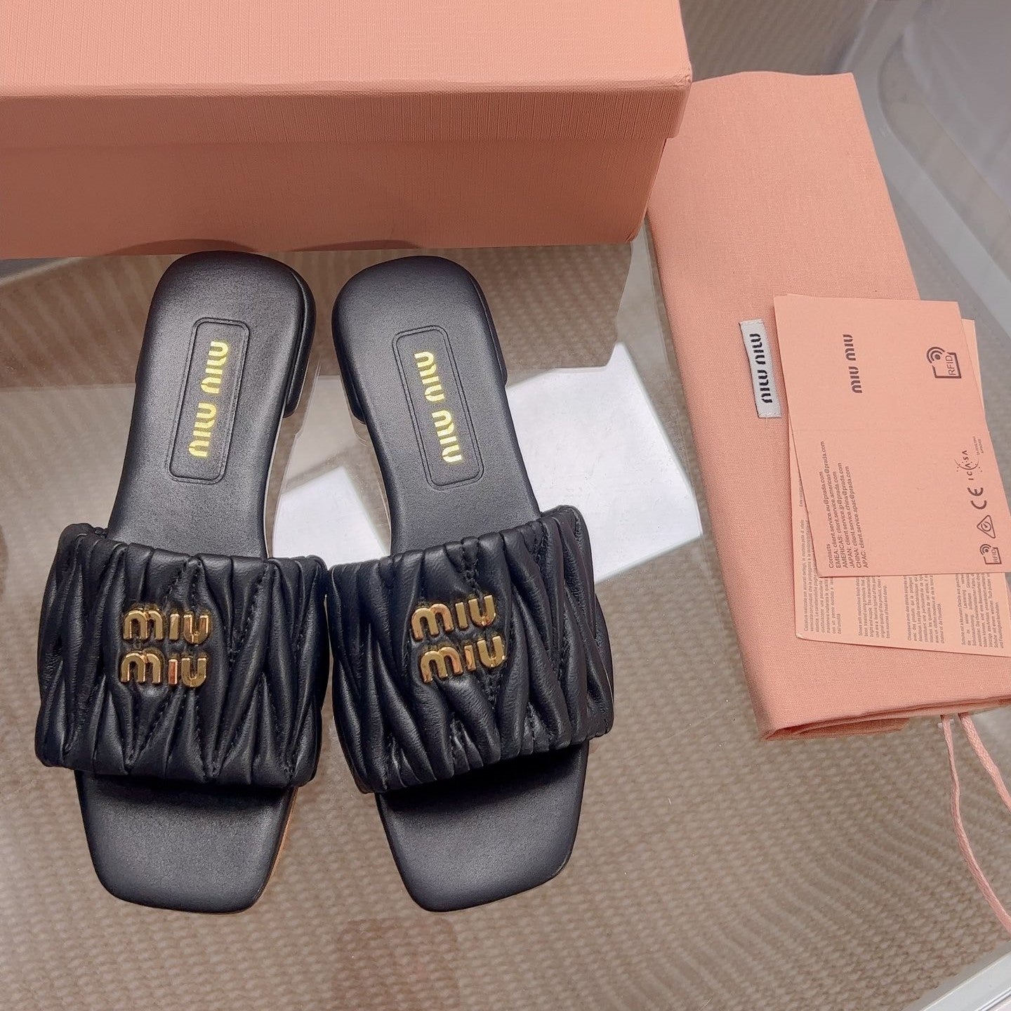 Miu Matelassé Slides Black Leather 739554