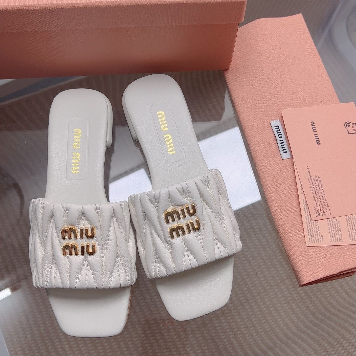 Miu Matelassé Slides Light Grey Leather 739555