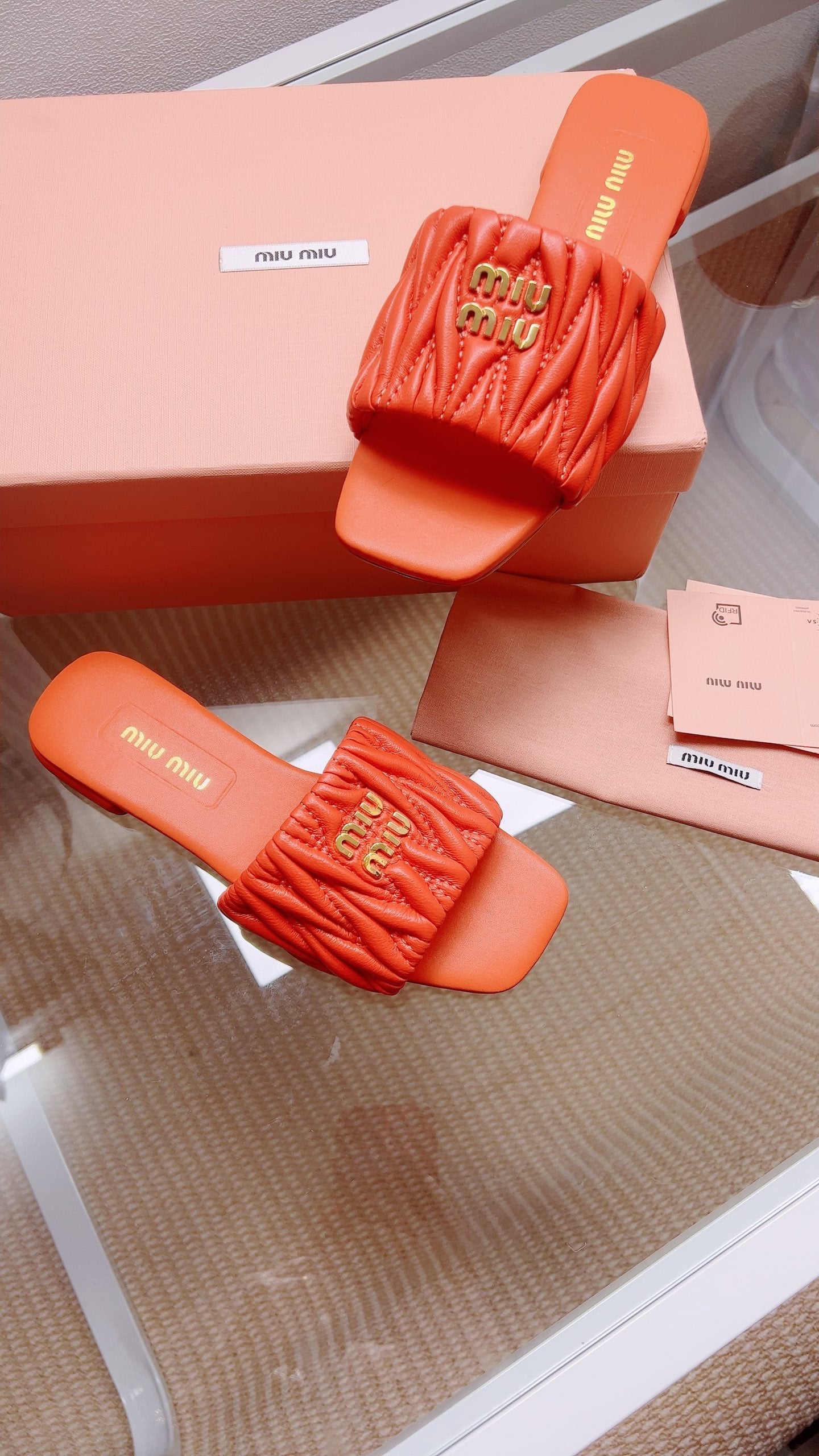 Miu Matelassé Slides Orange Leather 739556