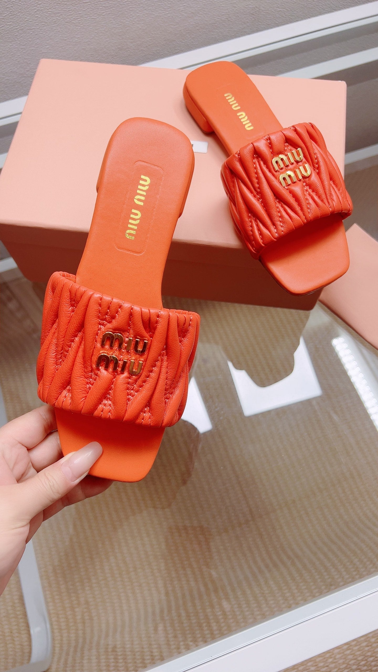 Miu Matelassé Slides Orange Leather 739556