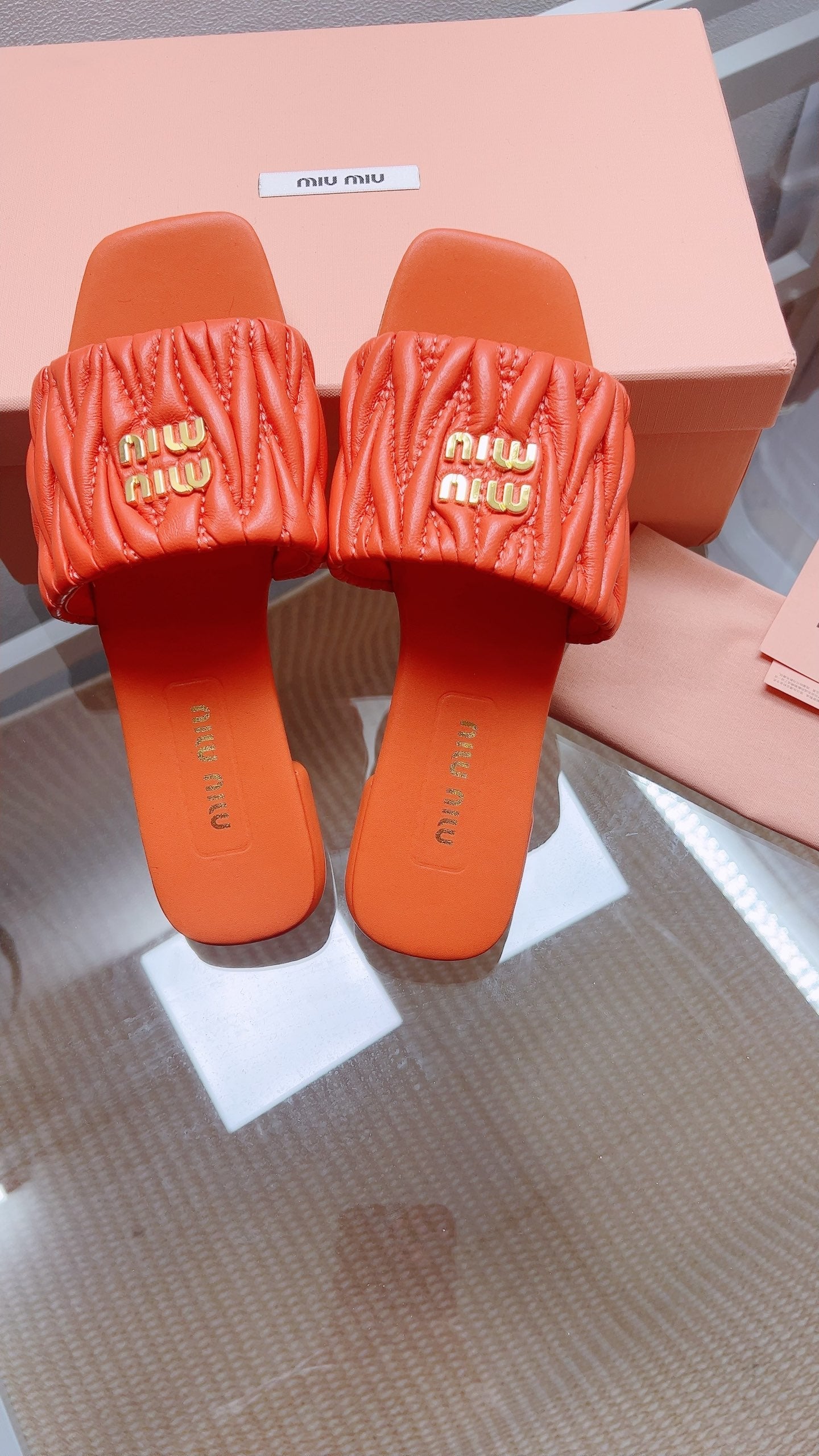 Miu Matelassé Slides Orange Leather 739556