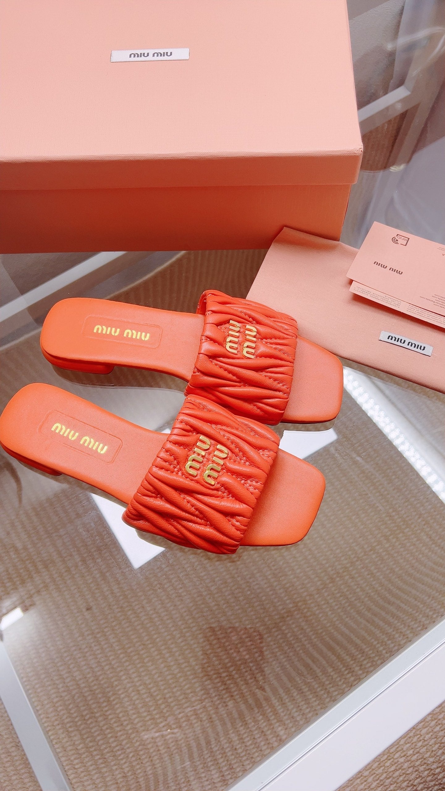 Miu Matelassé Slides Orange Leather 739556