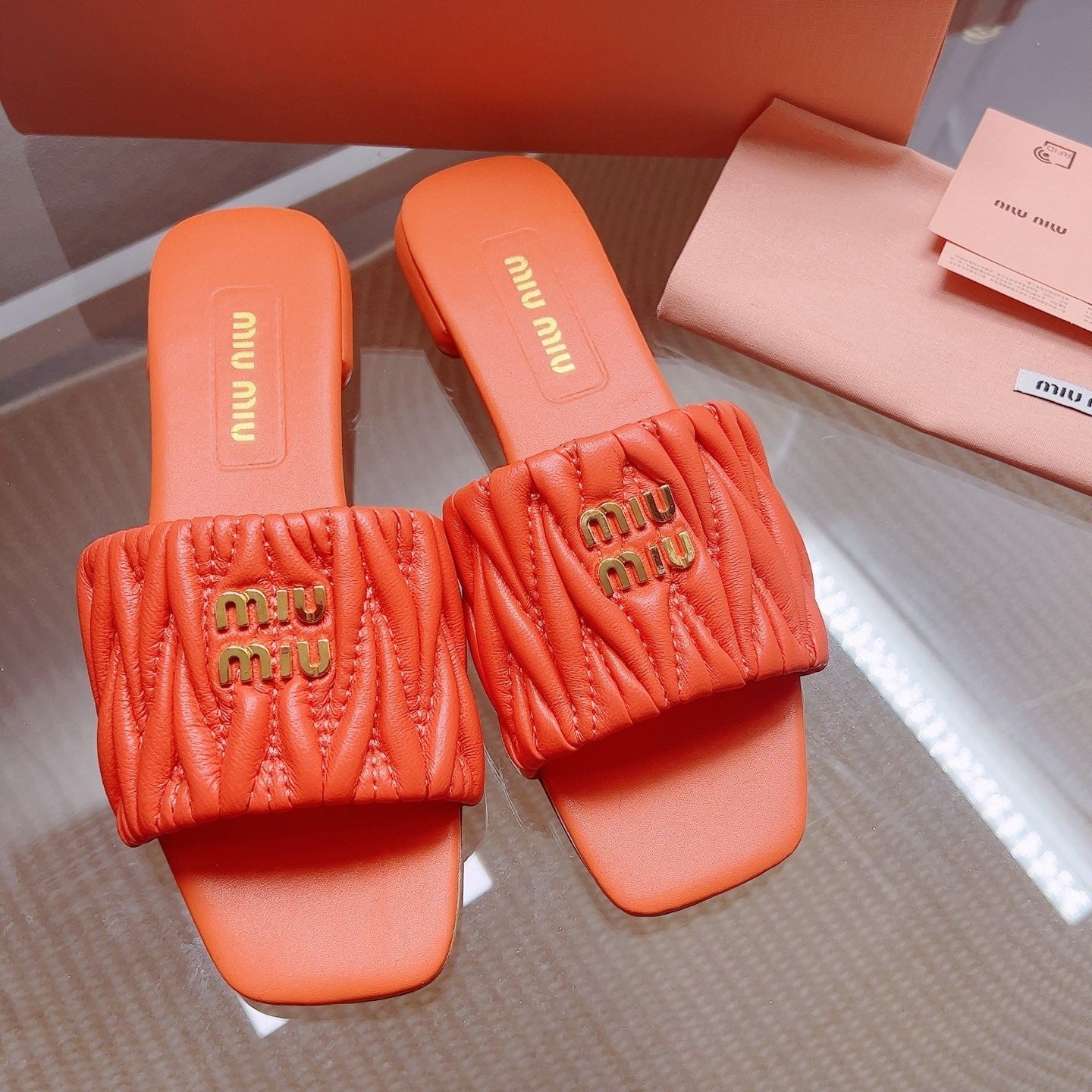 Miu Matelassé Slides Orange Leather 739556