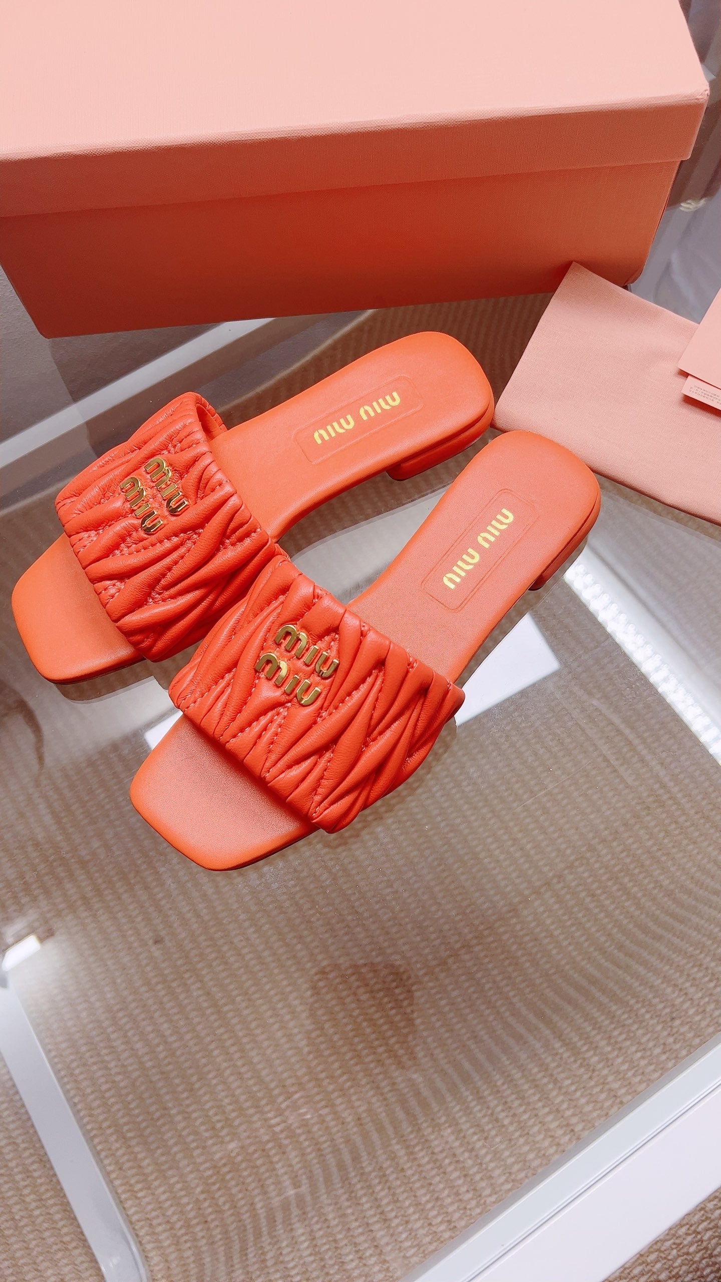 Miu Matelassé Slides Orange Leather 739556