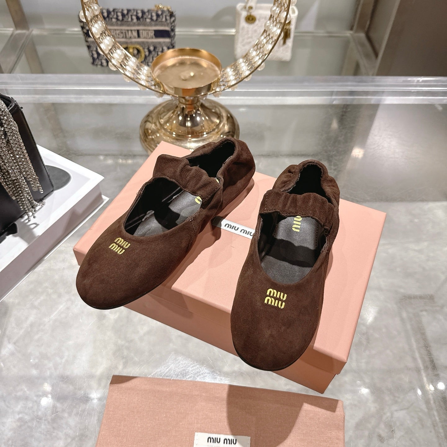Miu 26s Mary Jane Flats In Dark Brown Suede Elastic Strap