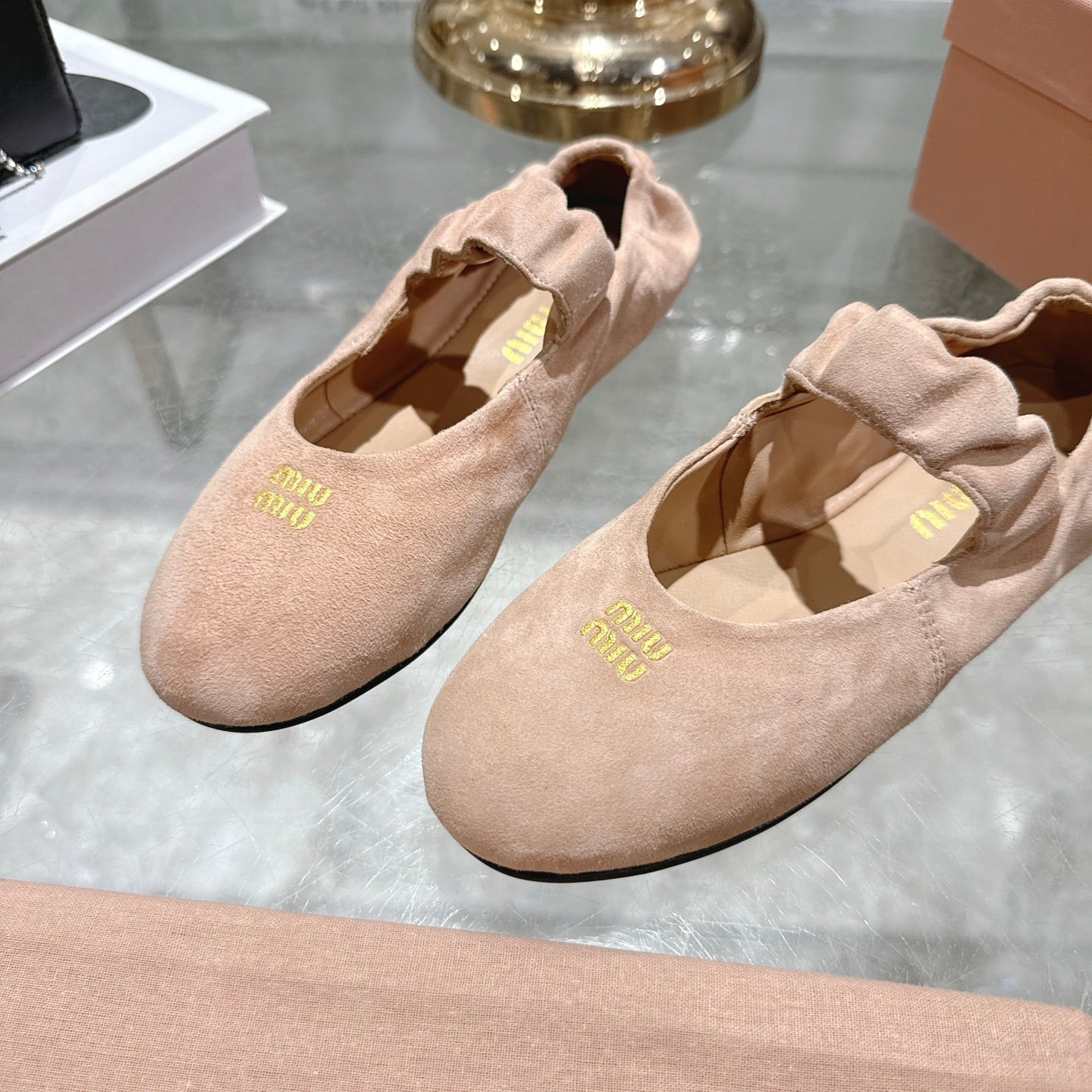 Miu 26s Mary Jane Flats In Light Pink Suede Elastic Strap