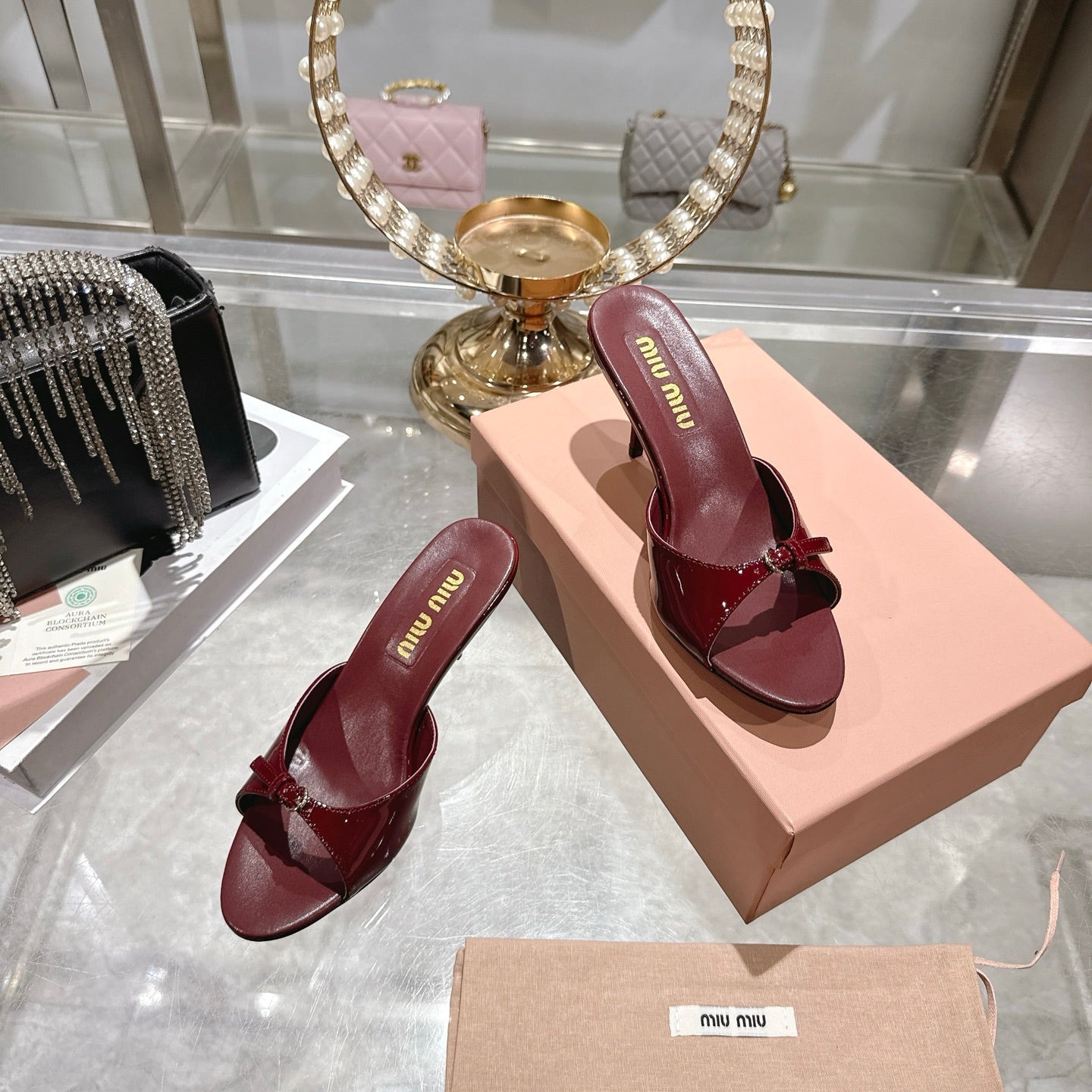 Miu Mules With Buckle Patent Leather 751337