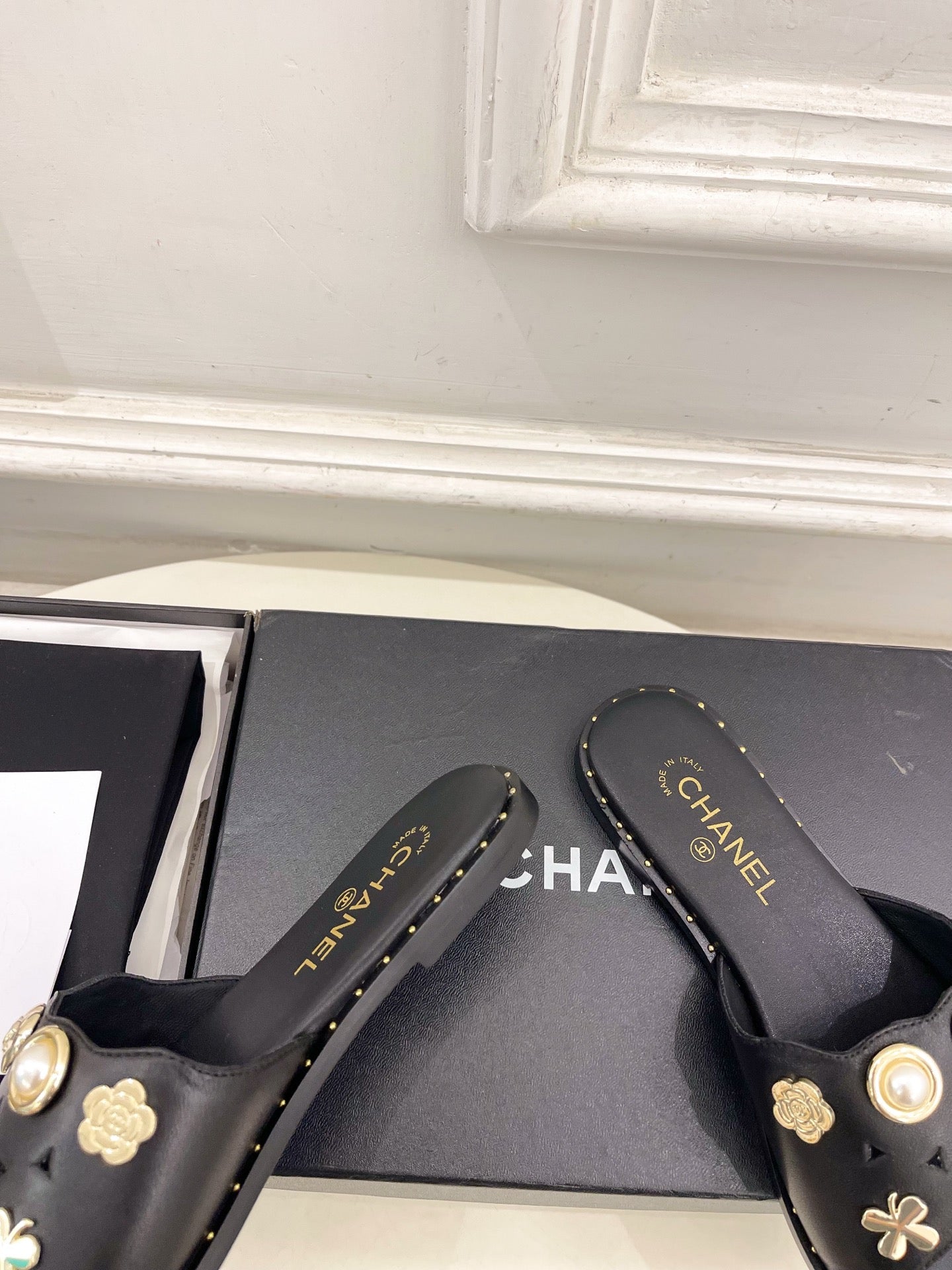 Chanel 26s Flat Sandals Black Lambskin Charm-Decorated