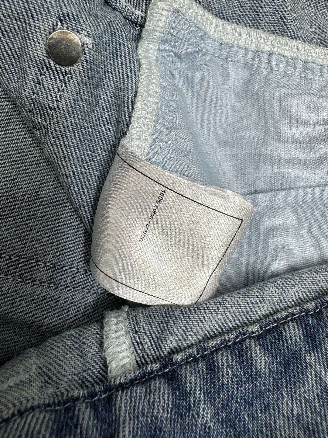 CHANEL HIGH-WAIST STRAIGHT-LEG DENIM PANTS