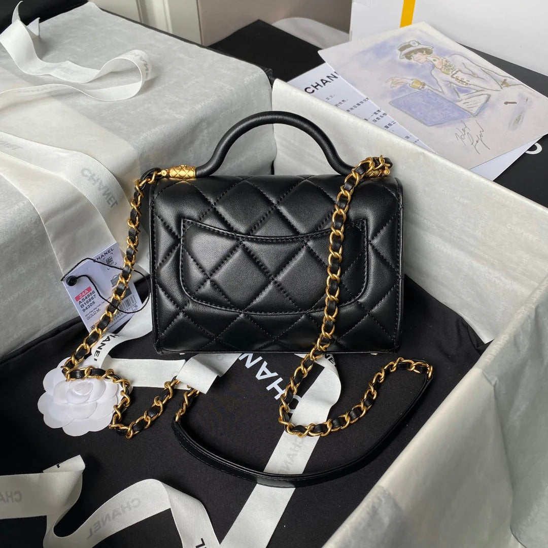 CC 25S FLAP BAG 18 CM IN BLACK LAMBSKIN WITH TOP HANDLE