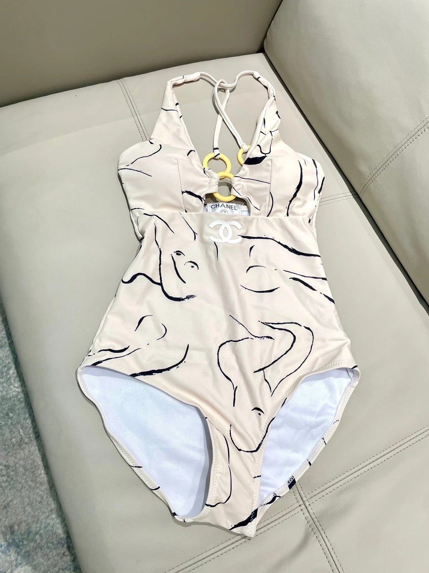 CC BIKINI SWIMSUIT SET IN CREAMY WHITE MIXED WITH CURVED BLACK DETAIL 608919