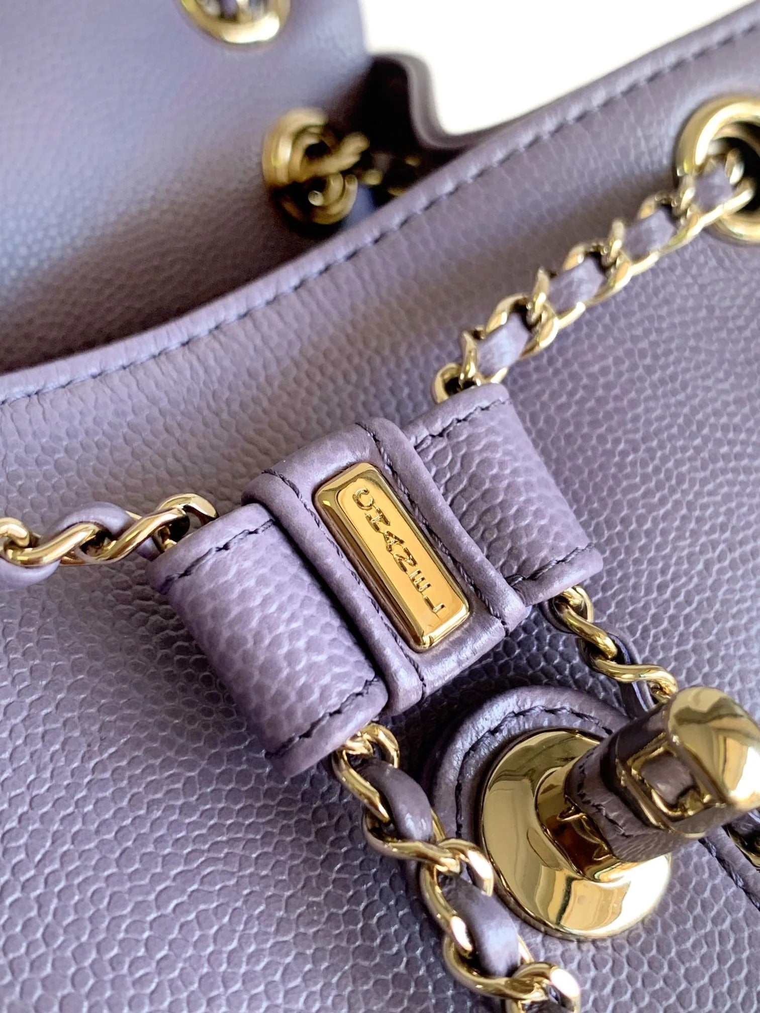CHANEL 25S BACKPACK 21 CM IN PURPLE LAMBSKIN