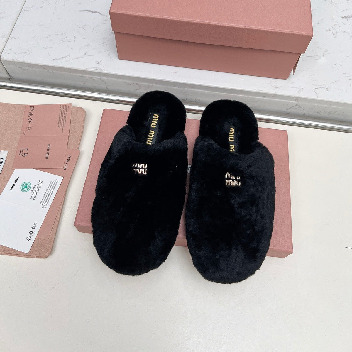 Miumiu 26S Mules Black Shearling