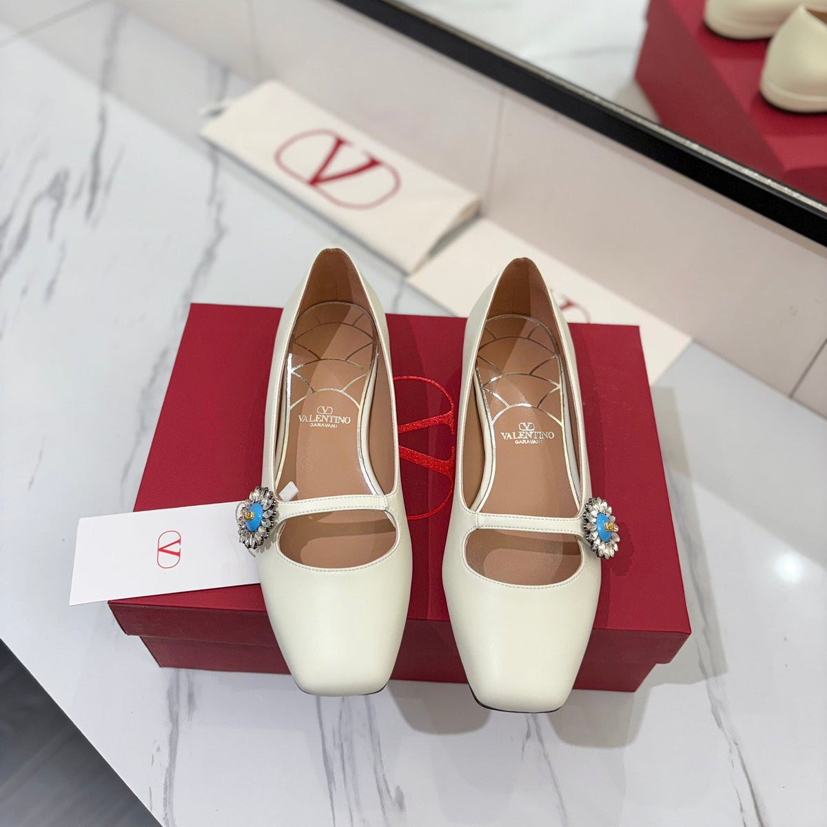 VLTN 26s Mary Jane Flats In White Calfskin With Crystal Flower